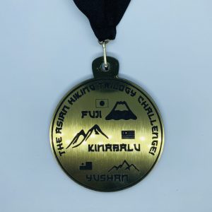 asian-hiking-trilogy-medal